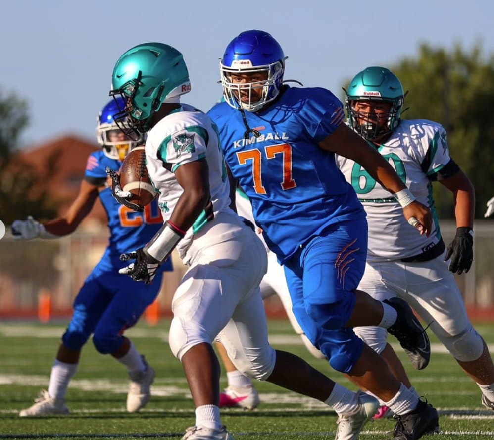 Kimball defense steps up to stop Burton’s offense. From Kimball High Football Instagram page.